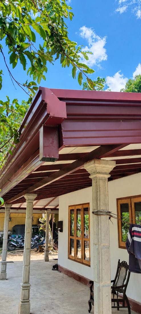 Seamless gutter with fascia boxing on a veranda