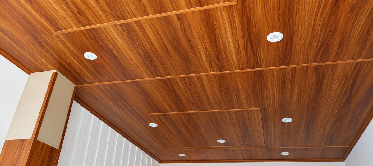 Rich teak wood plank ceiling installation